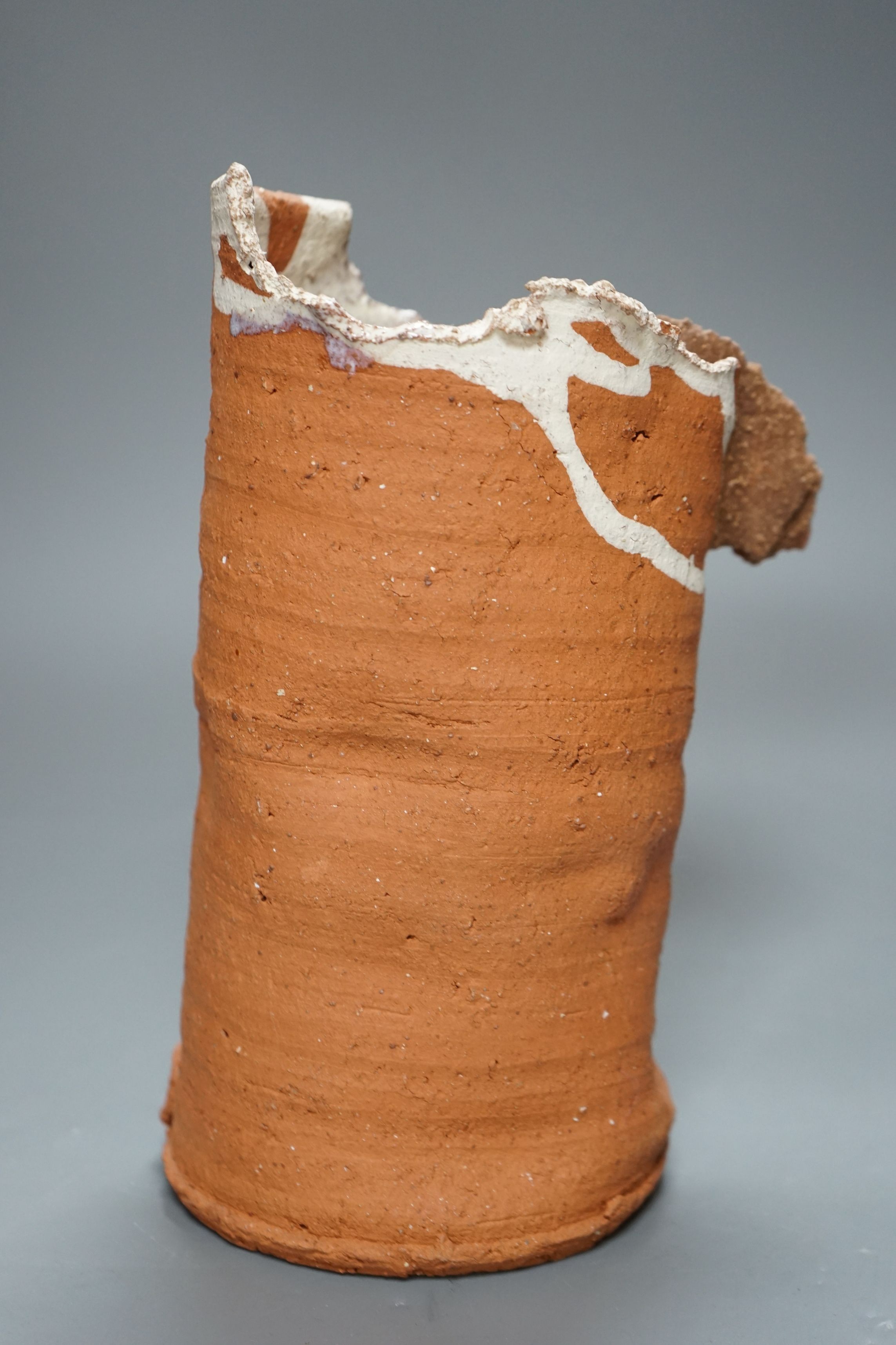 Peter Smith, a thrown terracotta cylindrical vessel with white glaze to the interior and brown nose vessel, with original purchase receipt, impressed mark to base rim, 26.5cm tall
